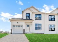 duplex home white siding