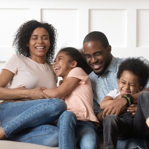 family on couch in a One Story Townhome in Camp Hill, PA